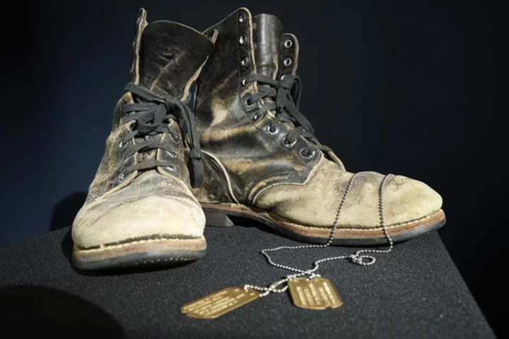 Boots and dog tags Alan Alda wore on ‘M-A-S-H’ sell at auction for $125,000 that will go to charity